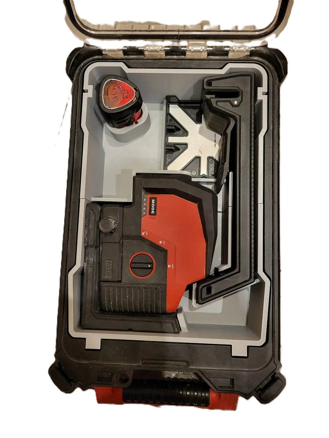 Milwaukee M12 Laser Level Insert for Packout Box #48228435 displayed within a Packout Box, showcasing how the insert holds tools securely for optimal protection during transport.