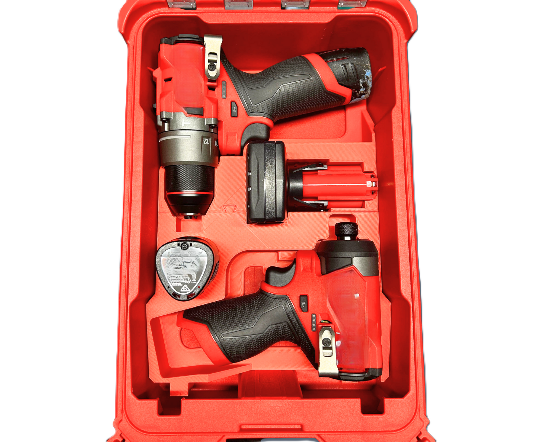 Inside view of Milwaukee Packout M12 Insert, illustrating dedicated spaces for M12 Drill, Impact Driver, and batteries for optimized tool arrangement.