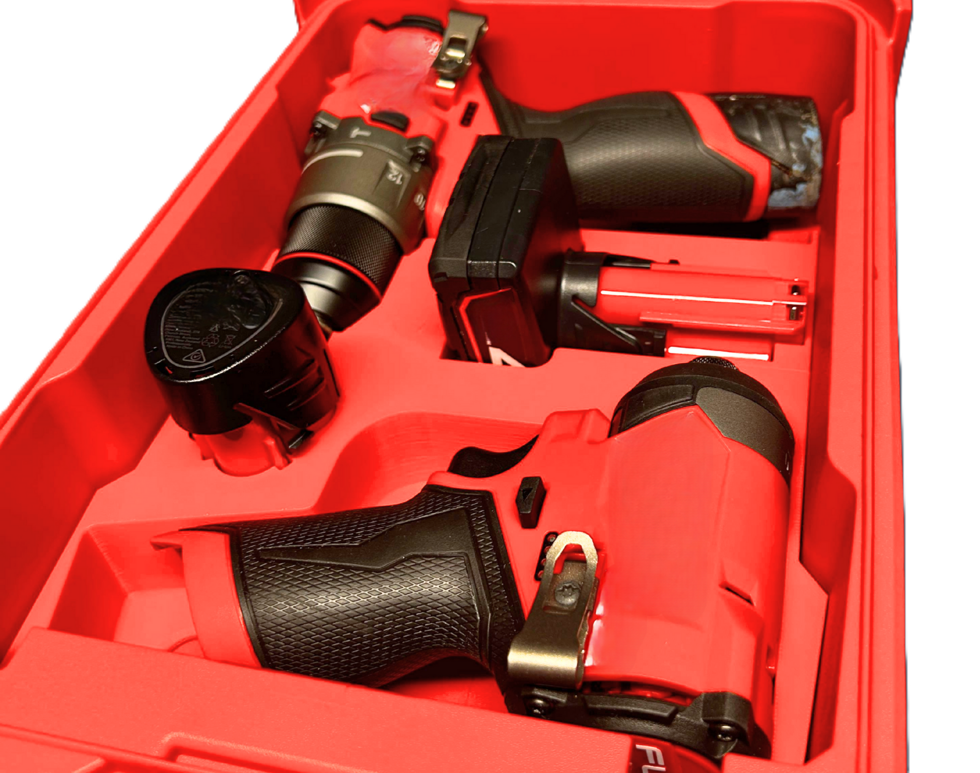 Close-up view of Milwaukee Packout Insert for M12 Drill and Impact Driver, demonstrating organized layout for efficient storage and access.
