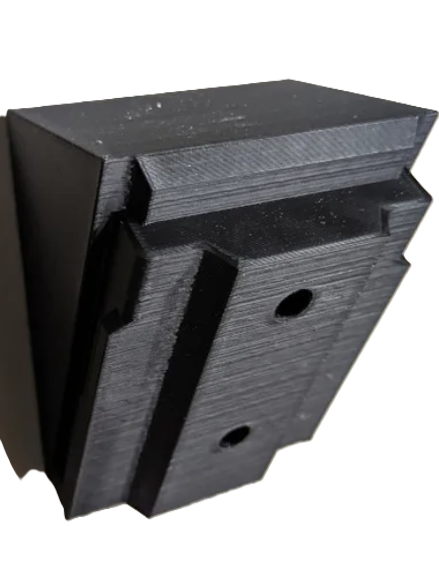 Close-up of the EGO Flat Wall Mount Battery Holder for 56V ARC Lithium Battery LB6020 highlighting its robust black construction for durability.