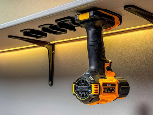 Dewalt 18V Heavy-Duty Wall Mount Tool Organizer displaying a power drill mounted securely on a shelf, showcasing the organizer's compatibility and convenience.