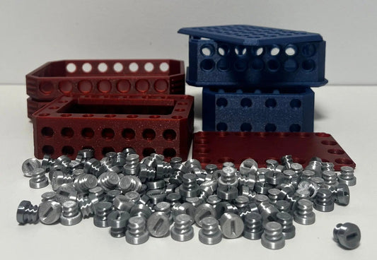 Sparkling Challenge Box with colorful red and blue designs featuring 134 screws scattered around, showcasing a fun and engaging puzzle toy for all ages.