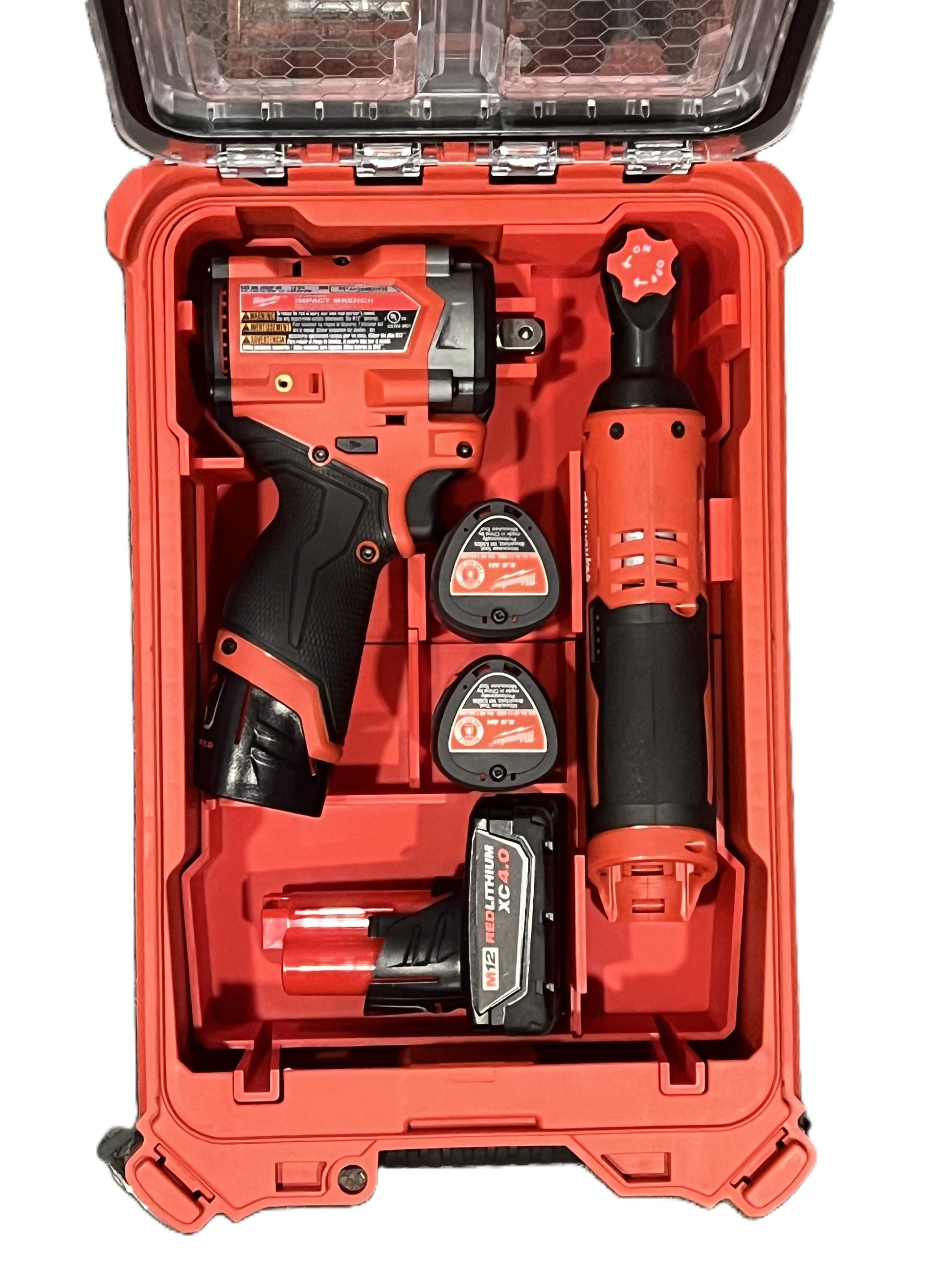 a tool kit in a red case with tools inside