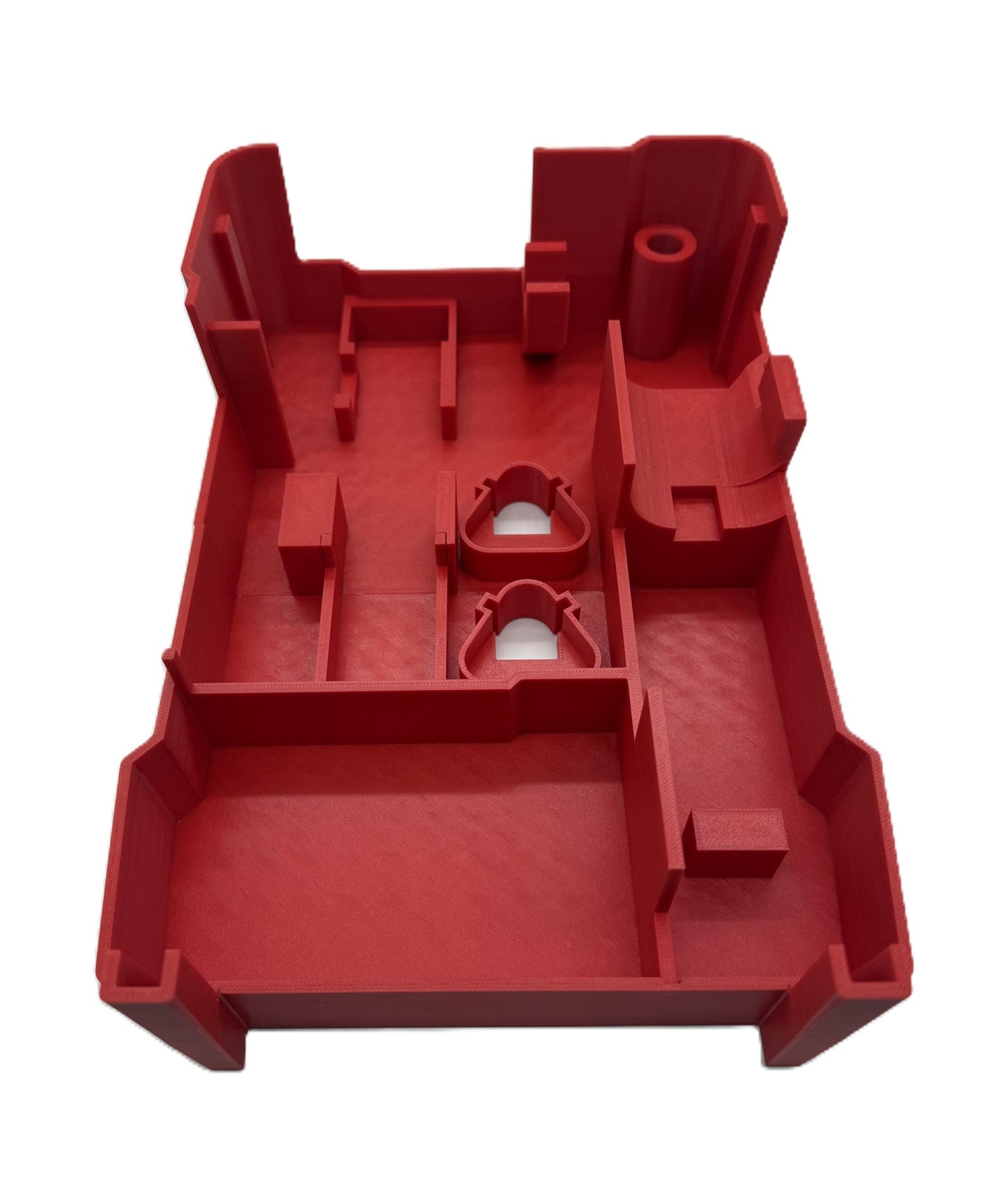 a red plastic tray with a hole in it