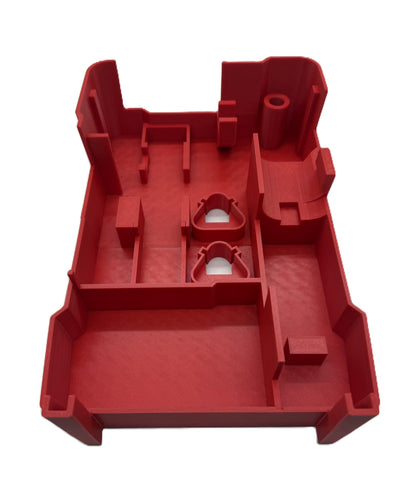 a red plastic tray with a hole in it