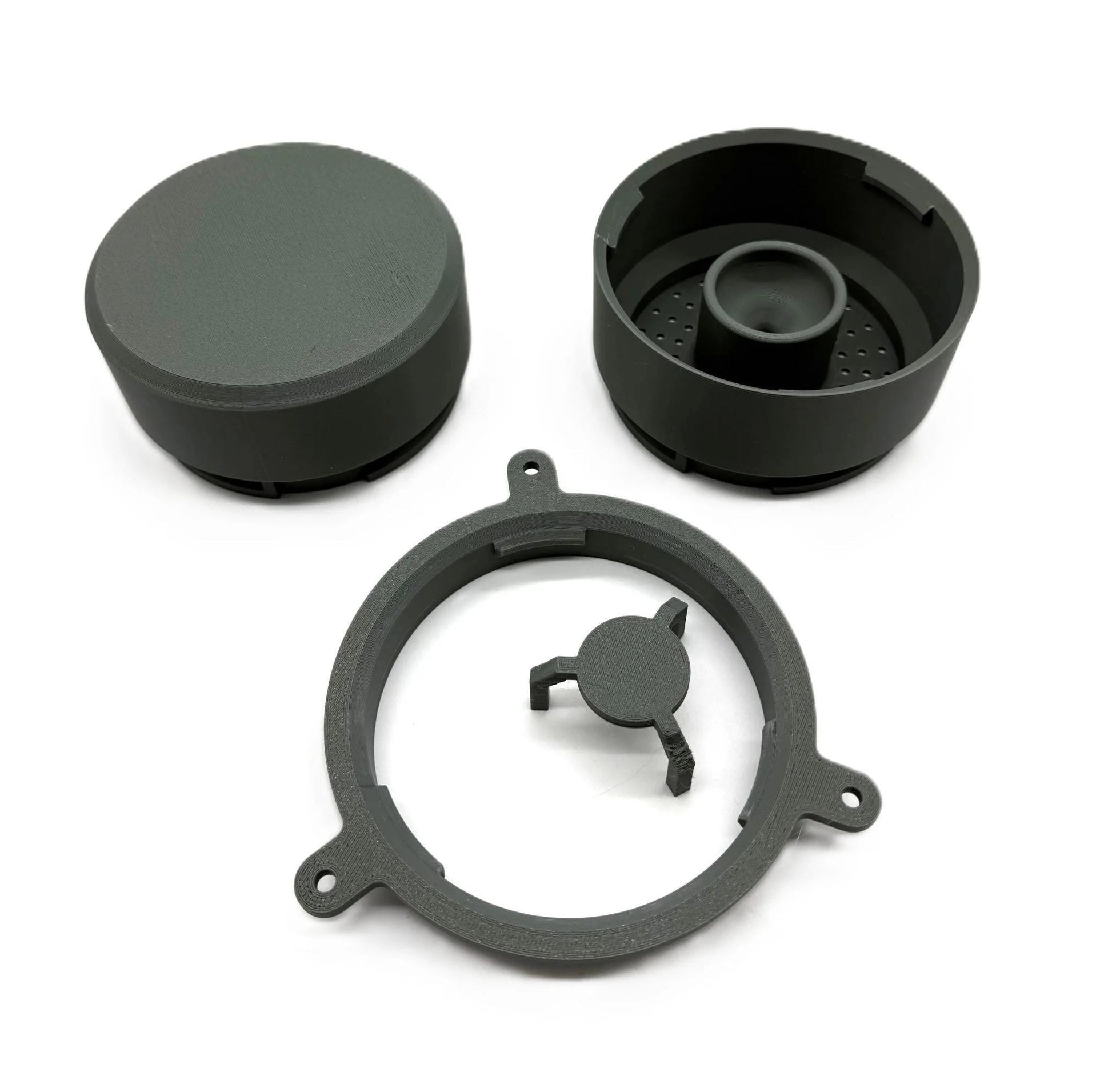 Modular components of The Handyman Depot Modular Hydroponic System Tower, showcasing three parts including a circular base, top cap, and inner holder designed for efficient plant growth in hydroponics.