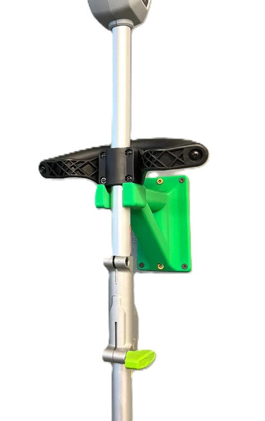 EGO String Trimmer Wall Mount Holder securing EGO string trimmer, showcasing its durable black and green design, ideal for efficient garage organization.