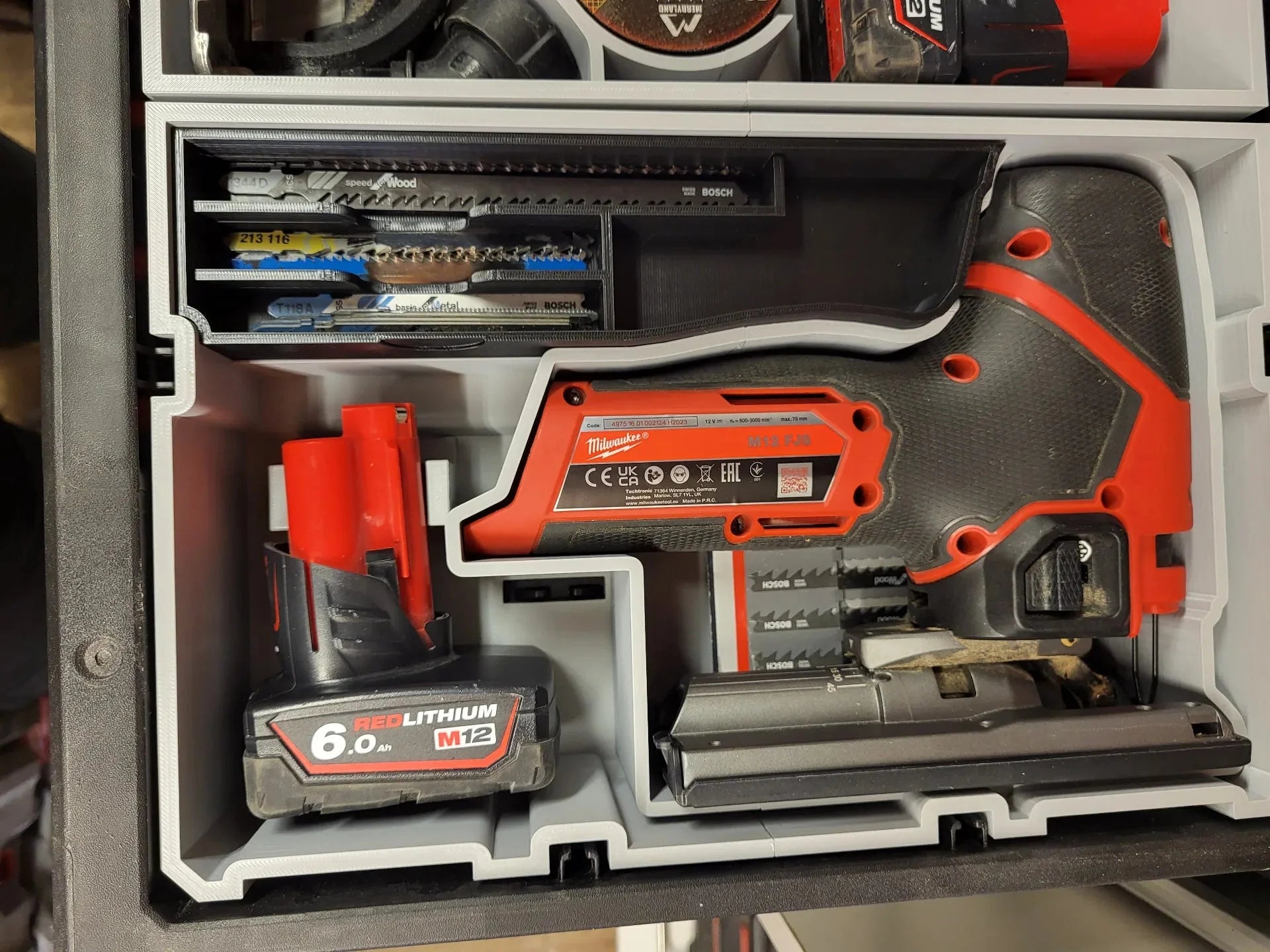 Packed tools within Packout Insert for M12 Fuel Jigsaw – USA 2445-20 / AUS/UK M12JS, showcasing an efficient arrangement for quick access and protection.
