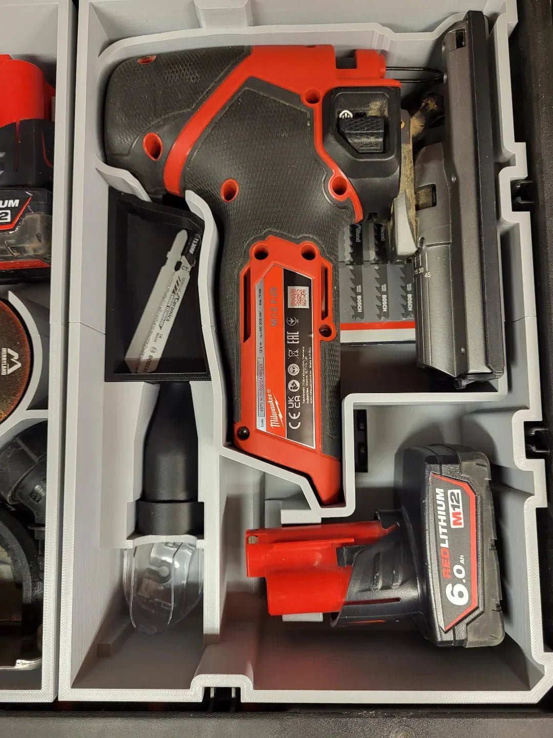 Detailed view of the Packout Insert for M12 Fuel Jigsaw – USA 2445-20 / AUS/UK M12JS in use, displaying the efficient organization of tools and accessories.