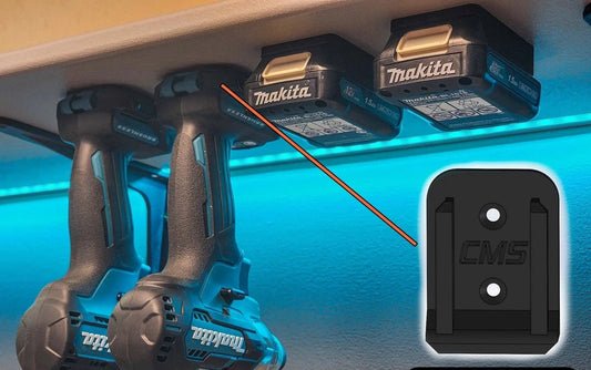 Makita M12 Deep Tool Holder featuring wall-mounted battery tool organizer with Makita batteries and tools displayed for easy access in a workshop setting.