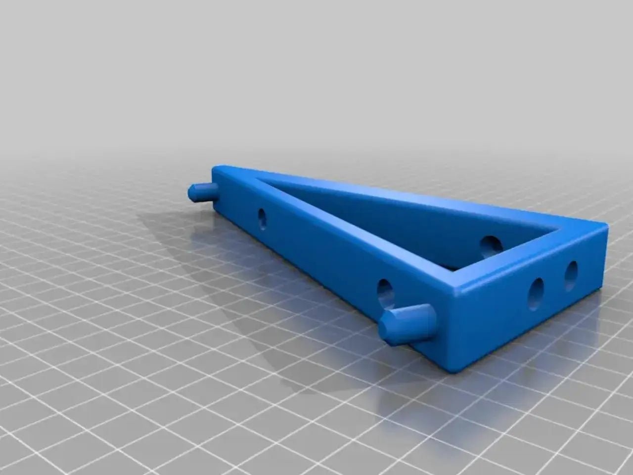 3D rendered blue prototype of the Makita 18V Dual Charger Wall Mount, highlighting its unique design and structural features for tool storage.