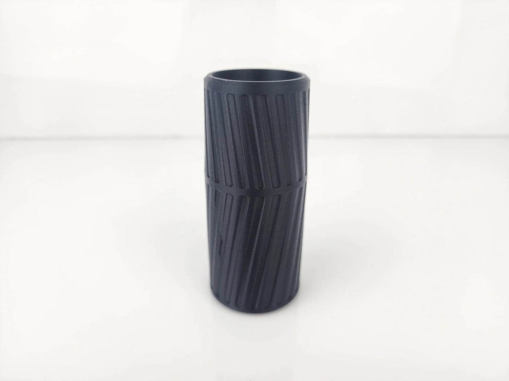 Makita 18V Router Vacuum Adaptor - Side view showcasing the textured design for enhanced grip and secure attachment during use.