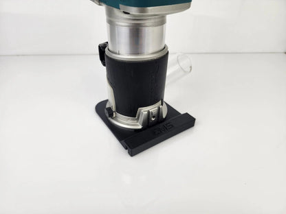 Rear view of Makita Router with attached Router Rail Guide, featuring dust extraction for cleaner operation during carpentry work.