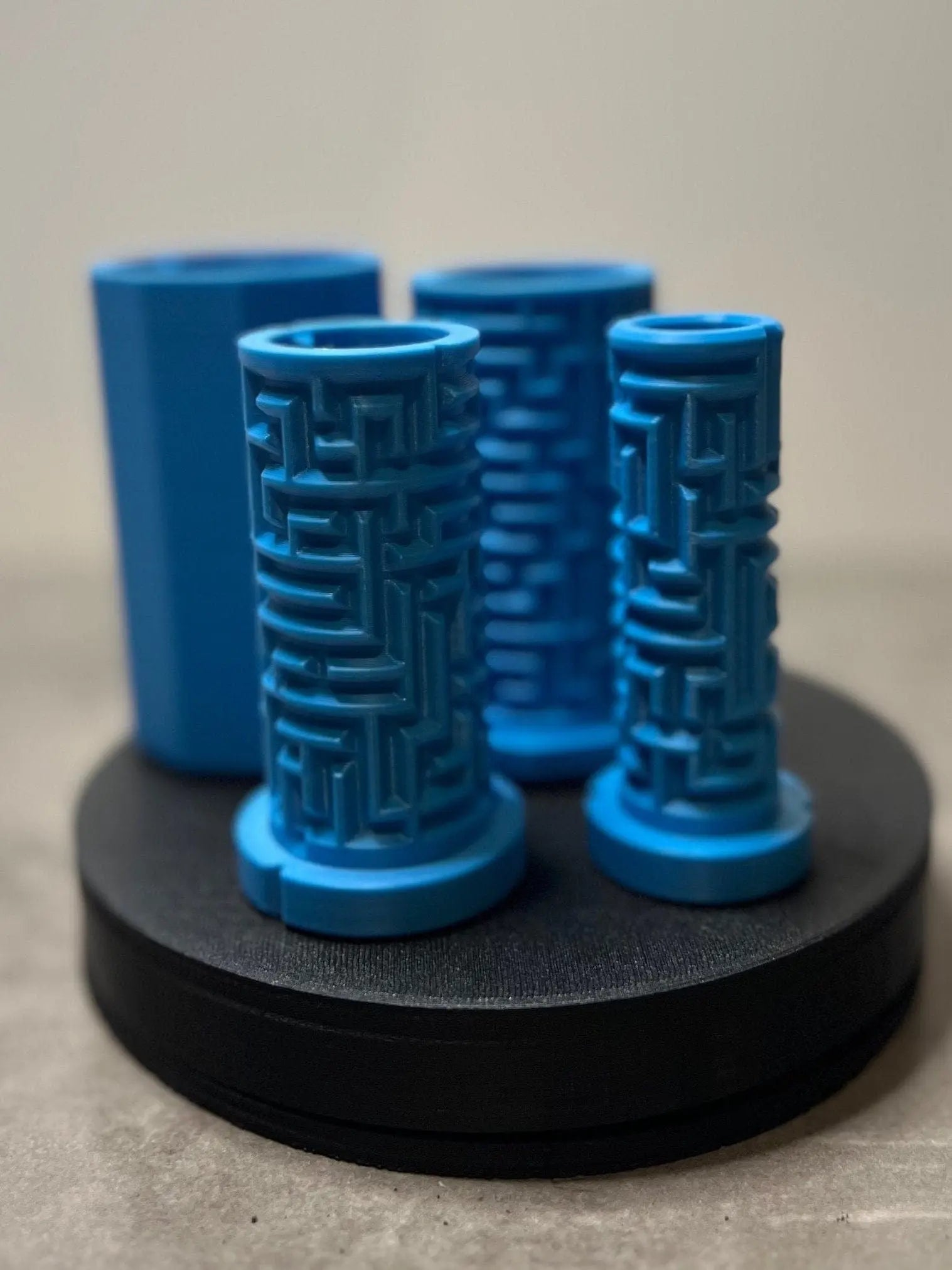 Maze Challenge 4-Piece Labyrinth Set - Family Game for Cognitive Skills showcasing four blue labyrinth pieces arranged on a black circular base, perfect for engaging family fun and cognitive skill development.