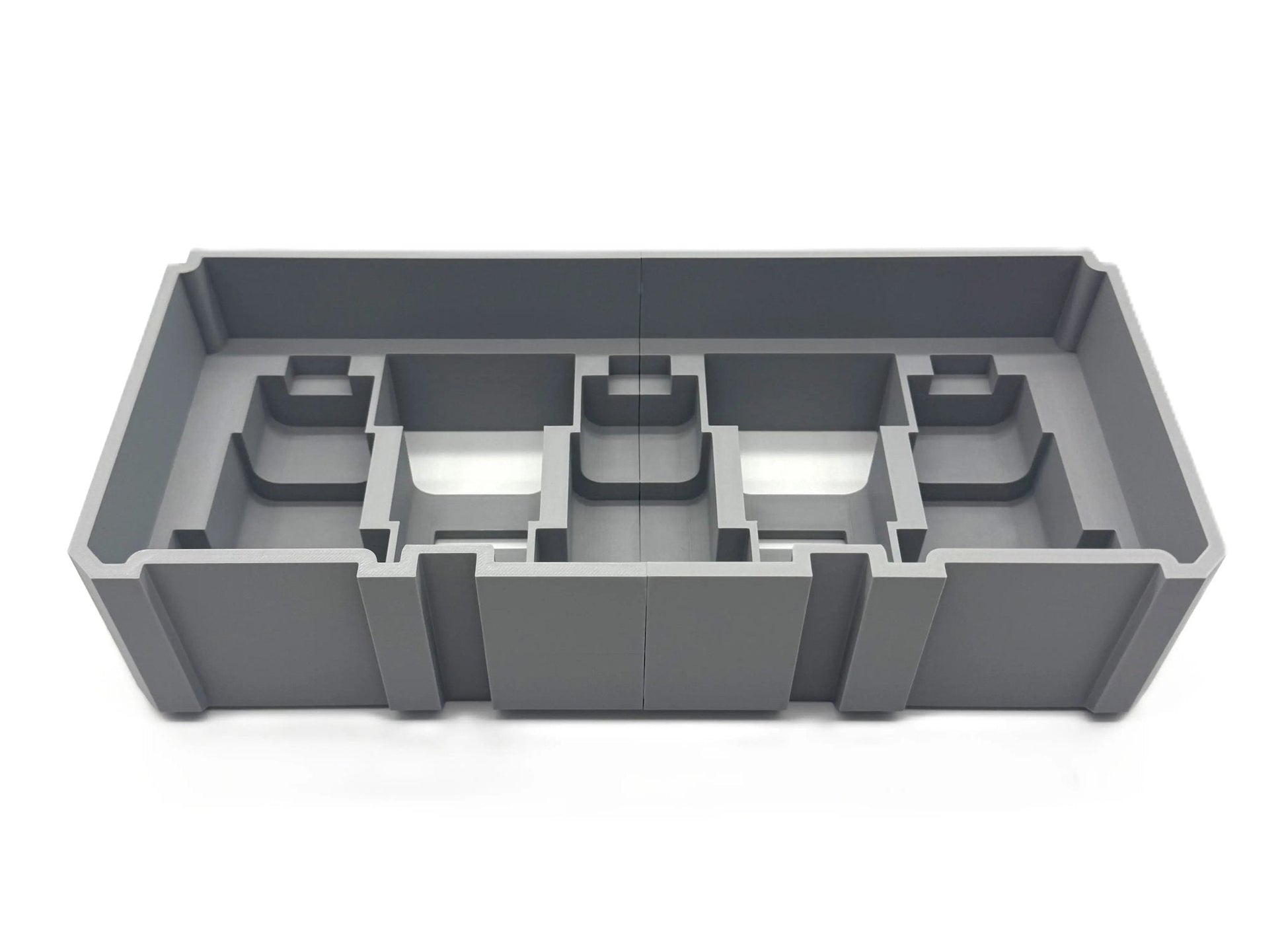 Milwaukee Packout Insert for M12 4.0Ah & 6.0Ah Batteries - Internal view of the gray plastic battery insert with designated compartments, perfect for Milwaukee tool storage.