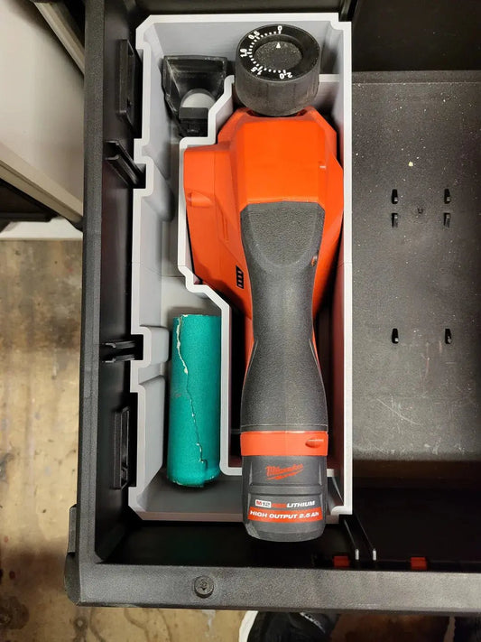 Insert to suit M12 Planer – USA 2523-20 for Milwaukee Packout system, showcasing the organized placement of tools in a durable storage solution.