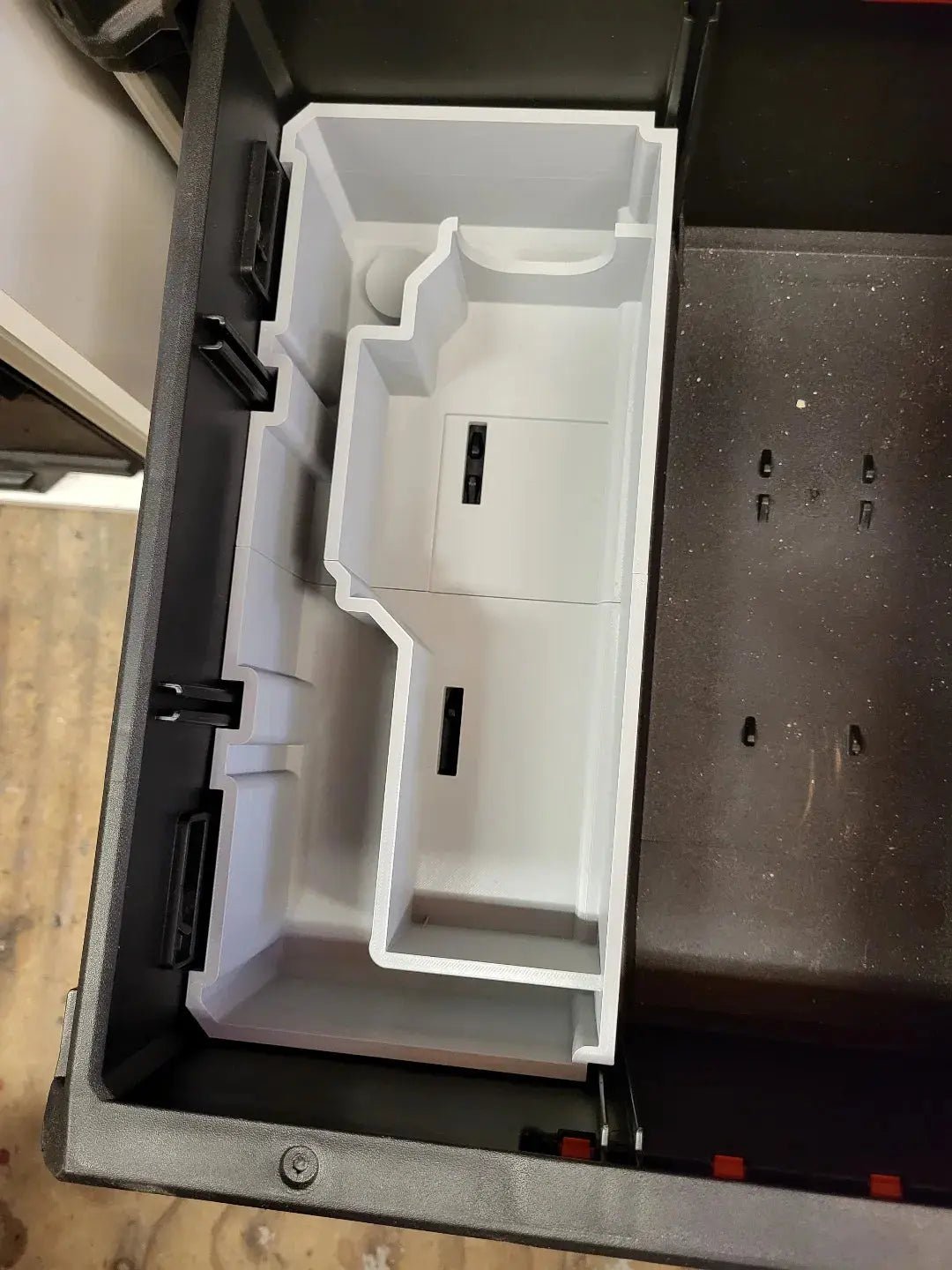 Interior view of the M12 Planer drawer insert designed for Milwaukee Packout, highlighting dedicated slots for enhanced tool organization.