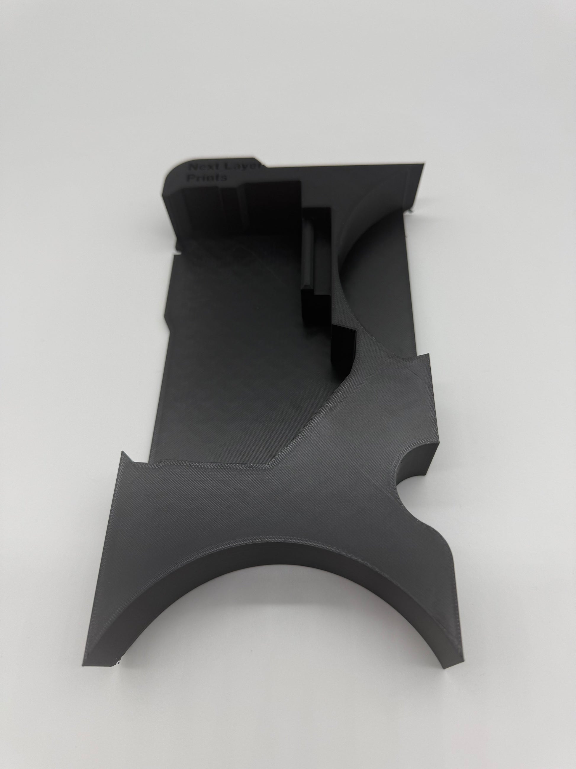 Another angle of the Packout Insert for M18 4.5" Grinder, illustrating its unique shape and compatibility with the Milwaukee Packout storage system.