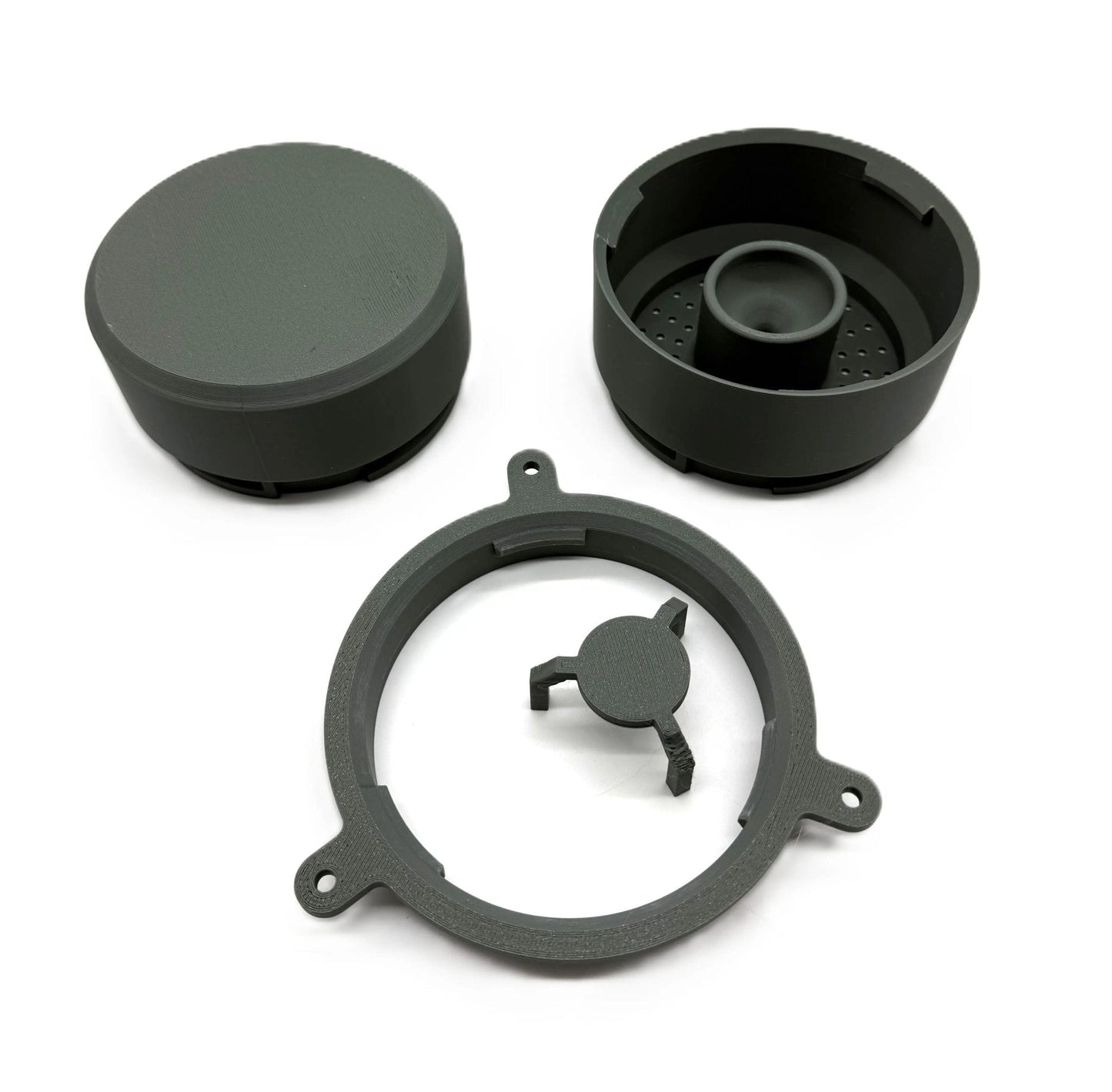 Modular components of The Handyman Depot Modular Hydroponic System Tower, showcasing three parts including a circular base, top cap, and inner holder designed for efficient plant growth in hydroponics.