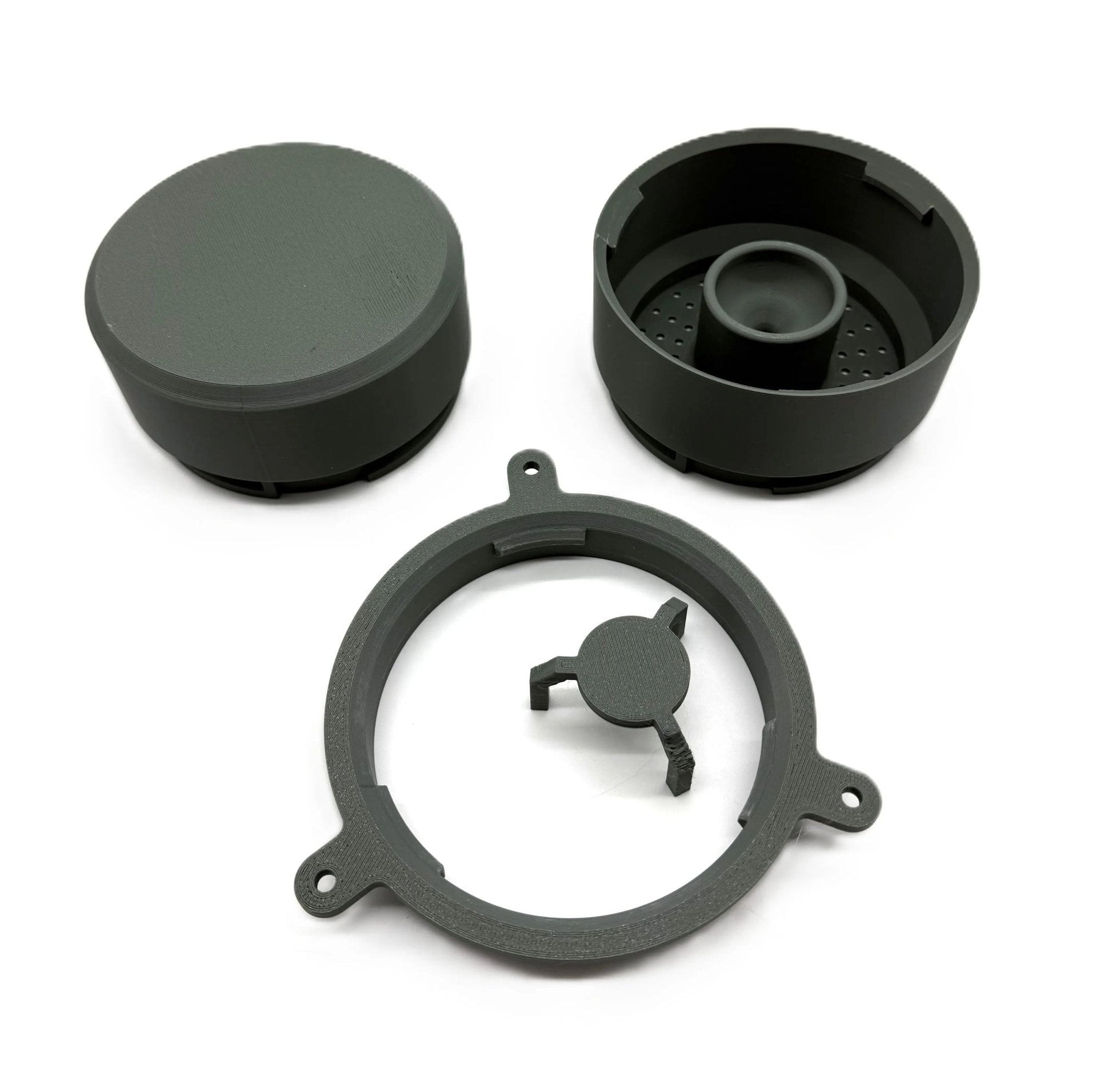Modular components of The Handyman Depot Modular Hydroponic System Tower, showcasing three parts including a circular base, top cap, and inner holder designed for efficient plant growth in hydroponics.