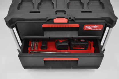 Inside view of a Milwaukee Packout toolbox containing the M18 Fuel SDS Rotary Hammer Drill Insert, displaying the rotary hammer drill, battery, and accessories for efficient tool storage and organization.