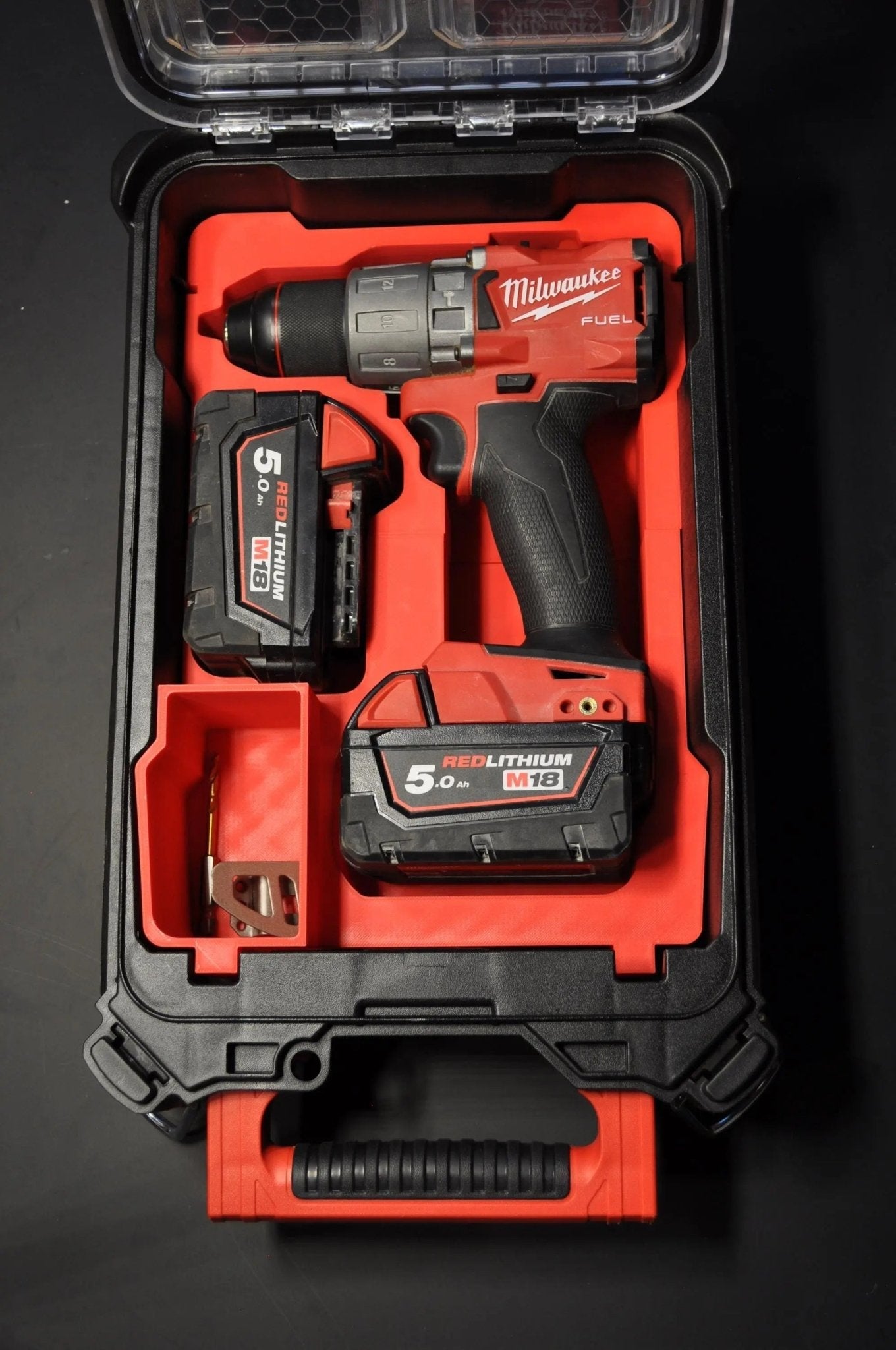 Milwaukee Packout Insert for M18 Fuel Drill – USA 2904-20 / AUS/UK M18FPD3 Gen 3 & 4, showcasing a red and black storage case containing a Milwaukee Fuel Drill and battery.