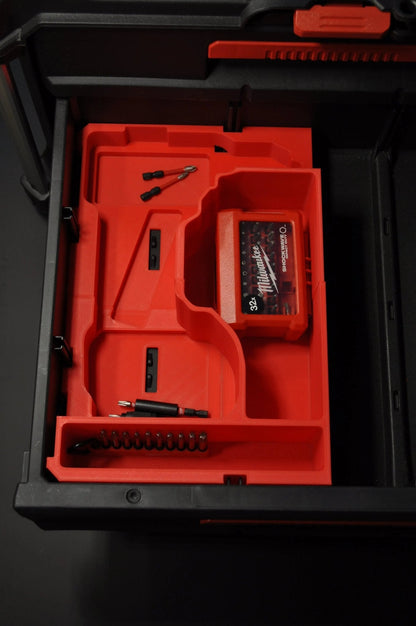 Interior view of Milwaukee Packout box tailored for M18 Fuel Hammer Drill Gen 4, showcasing the organized layout for tools and accessories, promoting efficient storage.