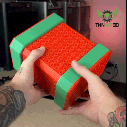 Person demonstrating the Card Holder Puzzle Box with 666 Screws, showcasing the unique interactive design and colors.