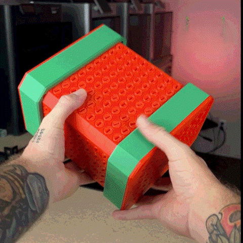 Close-up of a person manipulating the Card Holder Puzzle Box with 666 Screws, highlighting its engaging structure and playful features.