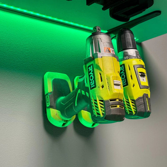 Ryobi 18V One+ Tool Holder showcasing two power tools securely mounted on a wall, ideal for organization and efficiency in workshops.