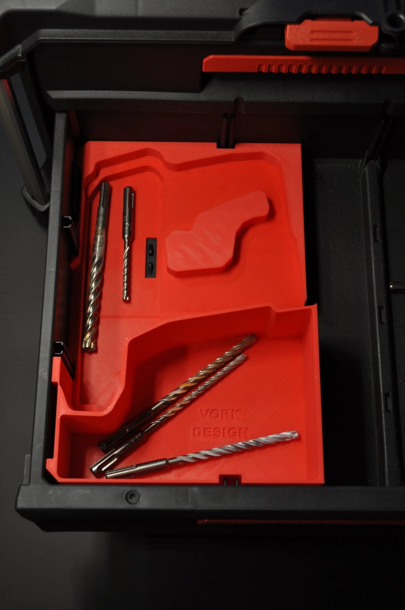 Packout Insert for M12 Fuel Rotary Hammer featuring slots for tools. Designed for Milwaukee Packout Draw System. Organizes and secures M12 Rotary Hammer tools.