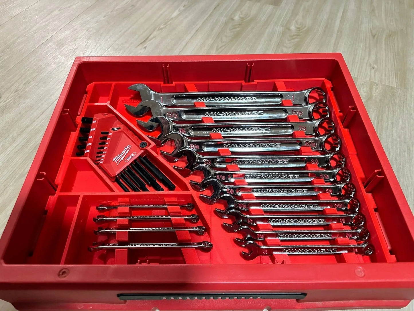 Milwaukee Packout Wrench Organizer Tray Insert for SAE & Metric Tools showing a neatly organized tray with various wrenches and tool slots, designed for efficient tool storage.