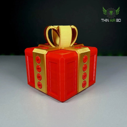 The Ultimate Challenge Gift Box featuring a vibrant red and gold design, showcasing the unique 3D printed packaging that holds 20 red and gold screws, ideal for engaging activities and creative problem-solving.